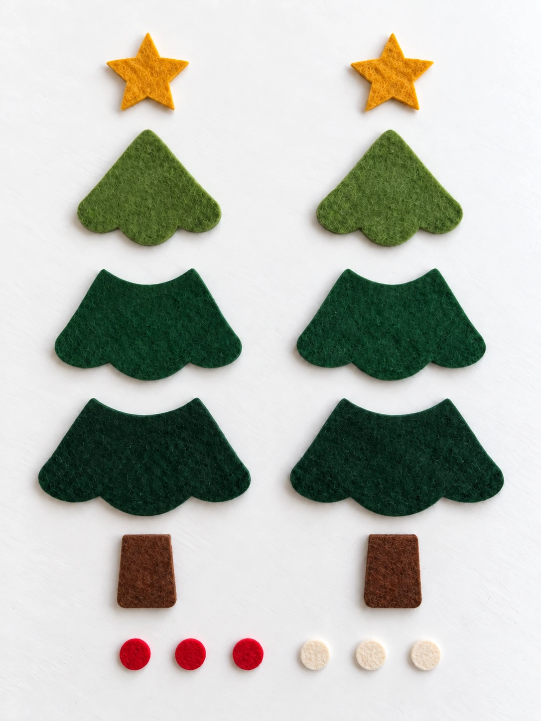 Sixteen cut felt pieces for the layered Christmas tree, arranged in matching pairs with three red and three cream circles