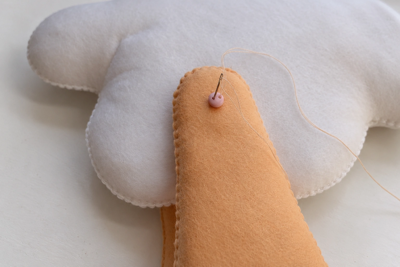 The opposite leg and its outside button added to the same joint thread